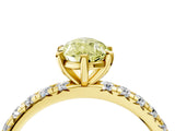 Yellow gold Fancy Yellow Pear Cut Diamond Pavé Solitaire Ring with Round Band and Prong Setting_16
