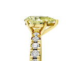Yellow gold Fancy Yellow Pear Cut Diamond Solitaire Pavé Engagement Ring with Round Band and Prong Setting_48