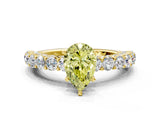 Yellow gold Fancy Yellow Pear Cut Diamond Solitaire Ring with Shared Prong Pavé Band and Four-Prong Setting_58