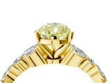 Yellow gold Fancy Yellow Pear Cut Diamond Solitaire Ring with Side Stones and Four-Prong Setting_54