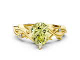 Yellow gold Fancy Yellow Pear Cut Diamond Solitaire Ring with Twisted Band and Prong Setting_195
