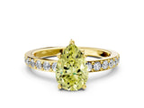 Yellow gold Fancy Yellow Pear  Cut Diamond Solitaire with Pave Band and Four-Prong Setting 1