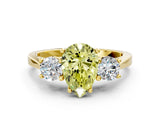 Yellow gold Fancy Yellow Pear Cut Diamond Three-Stone Engagement Ring with Prong Setting and Pavé Band