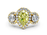 Yellow gold Fancy Yellow Pear Cut Diamond Three-Stone Halo Ring with Prong Setting and Pavé Accents