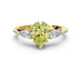Yellow gold Fancy Yellow Pear Cut Diamond Three-Stone Ring with Pear Side Stones and Four-Prong Setting_84