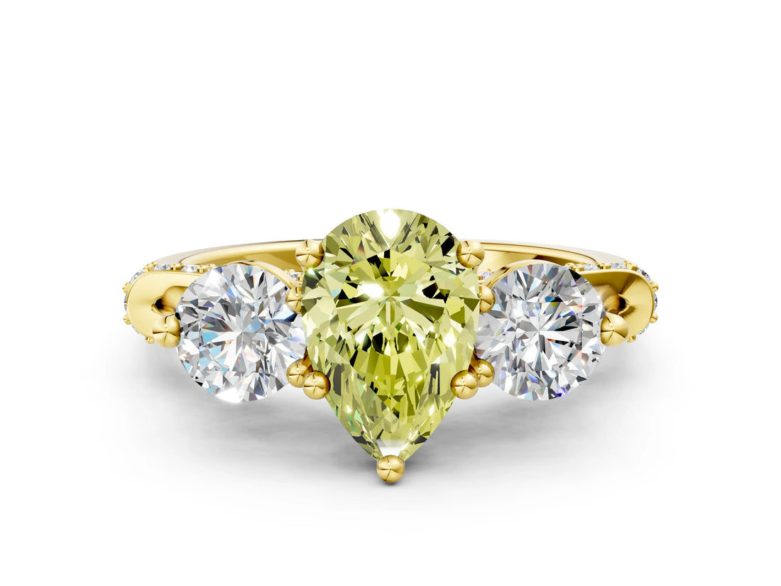 Yellow gold Fancy Yellow Pear Cut Diamond Three-Stone Ring with Prong Setting and Pavé Band