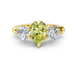Yellow gold Fancy Yellow Pear Cut Diamond Three-Stone Ring with Prong Setting and Pavé Band