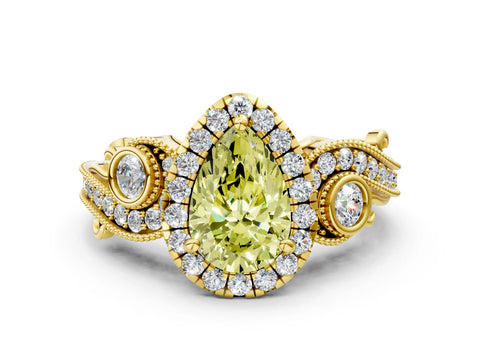 Yellow gold Fancy Yellow Pear Cut Halo Diamond Ring with Milgrain and Bezel Accents on a Split Shank Band