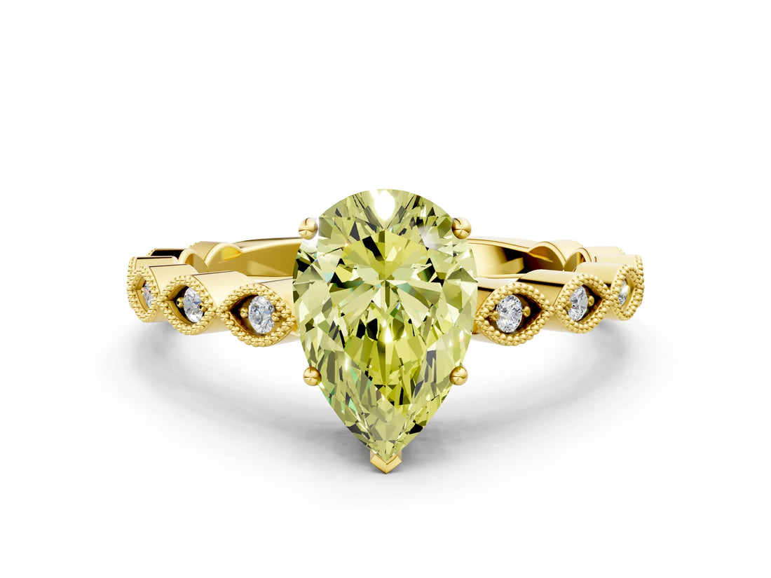 Yellow gold Fancy Yellow Pear Cut Solitaire Diamond Ring with Infinity Twist Band and Four-Prong Setting