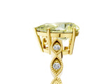 Yellow gold Fancy Yellow Pear Cut Solitaire Diamond Ring with Infinity Twist Band and Four-Prong Setting_5