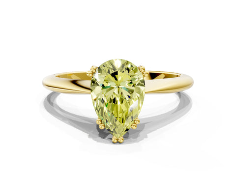 Yellow gold Fancy Yellow Pear Cut Solitaire Diamond Ring with Six-Prong Setting and Classic Band