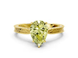Yellow gold Fancy Yellow Pear Cut Solitaire Milgrain Engraved Band with Four-Prong Setting