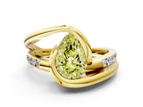 Yellow gold Fancy Yellow Pear Cut Solitaire Tension-Set Diamond Split Shank Ring