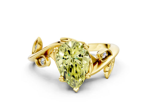 Yellow gold Fancy Yellow Pear Cut Solitaire Twist Engagement Ring with Leaf Accents and Prong Setting_12