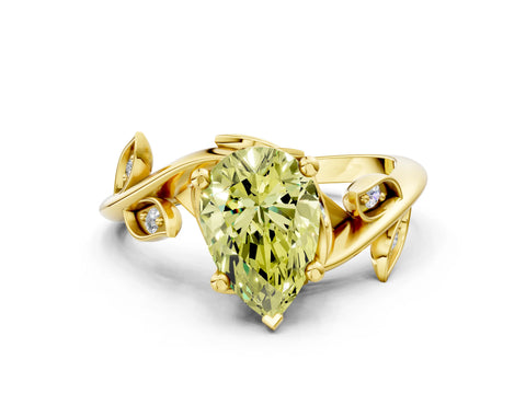 Yellow gold Fancy Yellow Pear Cut Solitaire Twist Engagement Ring with Leaf Accents and Prong Setting_12