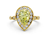 Yellow gold Fancy Yellow Pear  Halo Diamond Engagement Ring with Twisted Band and Four-Prong Setting