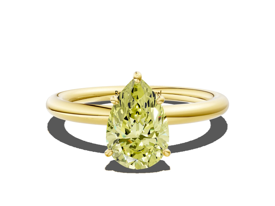Yellow gold Fancy Yellow Pear  Solitaire Diamond Ring with Four-Prong Setting on a Plain Band_22