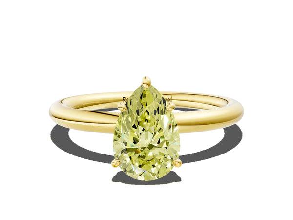 Yellow gold Fancy Yellow Pear  Solitaire Diamond Ring with Four-Prong Setting on a Plain Band