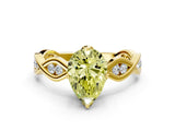 Yellow gold Fancy Yellow Pear  Solitaire Twist Band with Leaf Prong Setting