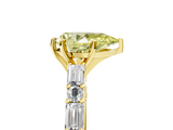 Yellow gold Fancy Yellow Pear  Solitaire with Side Baguettes and Channel Set Band_81