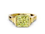 Yellow gold Fancy Yellow Princess Cut Brilliant Solitaire Diamond Ring with Channel Set Band and Bar Prong Setting
