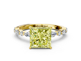 Yellow gold Fancy Yellow Princess  Solitaire with Side Stones on a Pavé Band and Four-Prong Setting