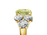 Yellow gold Fancy Yellow Radiant  Cut Diamond Cluster Ring with Round Accent Stones and Prong Setting on a Classic Band_53