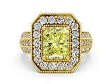 Yellow gold Fancy Yellow Radiant Cut Halo Diamond Engagement Ring with Pave Split Shank and Four-Prong Setting