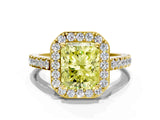 Yellow gold Fancy Yellow Radiant Cut Halo Diamond Ring with Pavé Band and Three-Prong Setting
