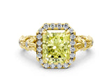 Yellow gold Fancy Yellow Radiant Cut Halo Diamond Solitaire with Filigree Band and Four-Prong Setting