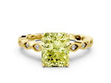 Yellow gold Fancy Yellow Radiant Cut Solitaire Diamond Ring with Infinity Twist Band and Four-Prong Setting