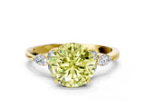 Yellow gold Fancy Yellow Round Cut Brilliant Diamond Solitaire Ring with Pear Side Stones and Four-Prong Setting_3