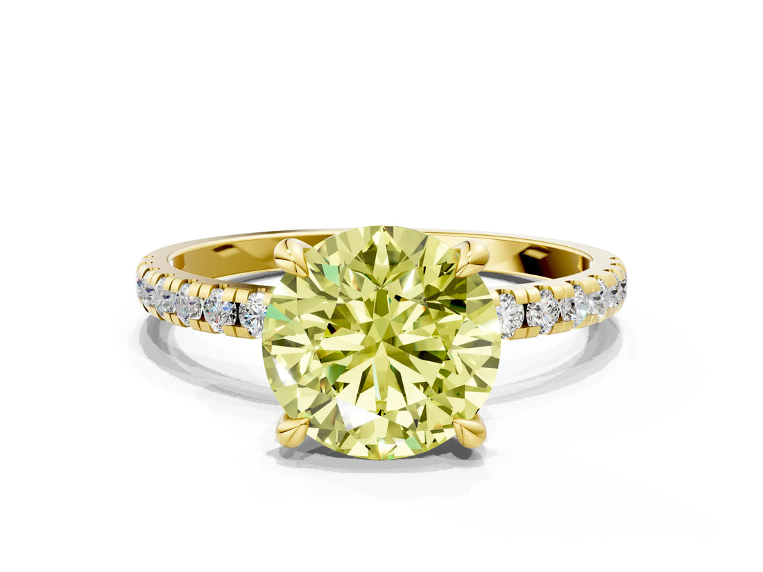 Yellow gold Fancy Yellow Round Cut Diamond Brilliant Solitaire Ring with Pavé Band and Four-Prong Setting