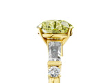 Yellow gold Fancy Yellow Round  Cut Diamond Ring with Baguette Side Stones, Channel Set Band, and Four-Prong Setting_41