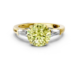 Yellow gold Fancy Yellow Round  Cut Diamond Ring with Tapered Baguette Side Stones in Four-Prong Setting