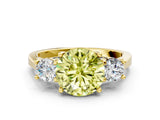 Yellow gold Fancy Yellow Round Cut Diamond Three-Stone Engagement Ring with Prong Setting and Pavé Band