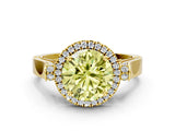 Yellow gold Fancy Yellow Round Cut Halo Round Diamond Twist Band with Four-Prong Setting
