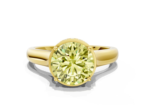 Yellow gold Fancy Yellow Round Cut Solitaire Diamond Engagement Ring with Four-Prong Setting and Tapered Band
