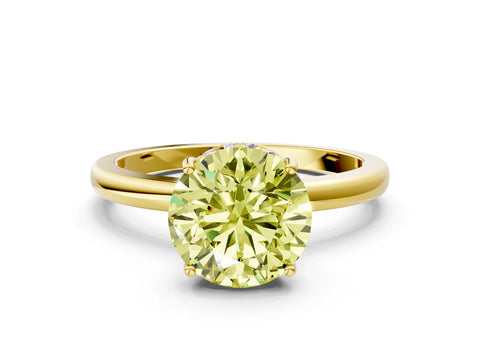 Yellow gold Fancy Yellow Round Cut Solitaire Diamond Ring with Prong Setting and Plain Band