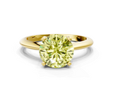 Yellow gold Fancy Yellow Round  Cut Solitaire Ring with Four-Prong Setting on a Classic Band