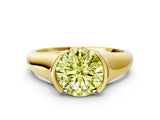 Yellow gold Fancy Yellow Round Cut Solitaire Tension Set Diamond Ring with Split Shank Band