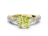 Yellow gold Fancy Yellow Round  Diamond Prong Setting with Side Stones on a Pave Band