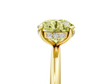 Yellow gold Fancy Yellow Round  Solitaire Diamond Ring with a Classic Band and Four-Prong Setting