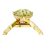 Yellow gold Fancy Yellow Round  Solitaire Twist Band with Leaf Prong Setting 4