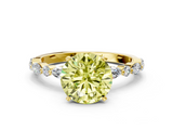 Yellow gold Fancy Yellow Round  Solitaire with Side Stones on a Pavé Band and Four-Prong Setting