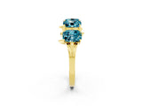 Yellow gold Four-Stone Elongated Cushion Blue Topaz Band with Nature-Inspired Prong Setting_8