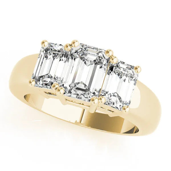 Yellow gold Three-Stone Radiant Cut Diamond Ring with Emerald Side Stones and Prong Setting
