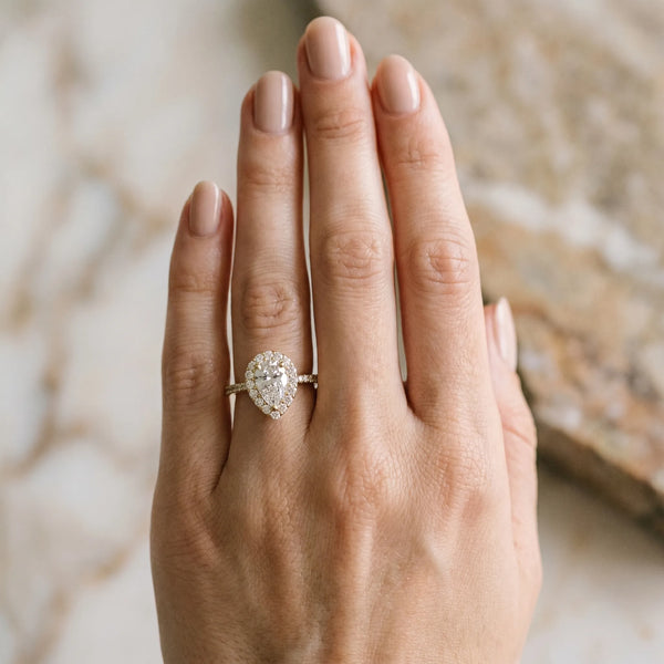 Yellow gold Halo Pear Cut Diamond Pavé Band with Three-Prong Setting