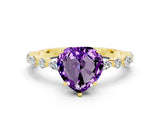 Yellow gold Heart Cut Amethyst Solitaire with Side Stones on a Pavé Band and Four-Prong Setting
