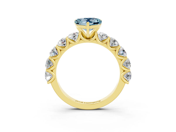 Yellow gold Heart Cut Aquamarine Prong Setting with Side Stones on a Pave Band